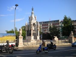 moped ride past the monument in Geneva