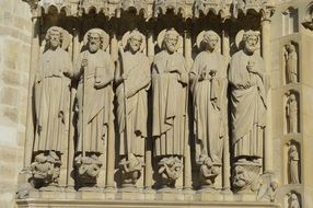 christian saints figures at facade, france, paris