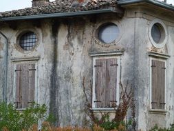 Old lapsed building on a cloudy day