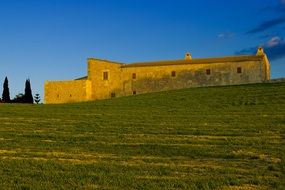 landscape of green old house on a field in Mallorca