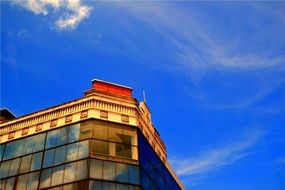 glass building against the blue sky