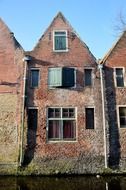 old brick houses at canal, netherlands