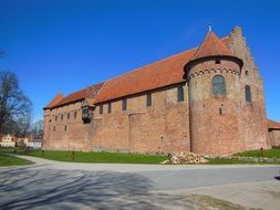 Medieval castle on a background of a bright blue sky