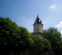 Tall building among the trees in Paris, France