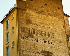 schlosser alt echt dusseldorfer alt text on the facade