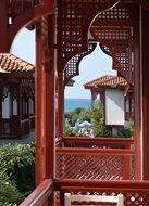 red wooden balcony at home