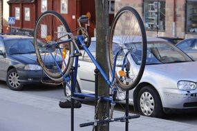 bike upside down on city street