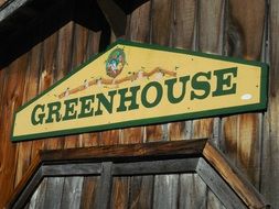 sign greenhouse wood wall building