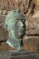 Sculpture of a head in the Old Catholic cemetery in Dresden