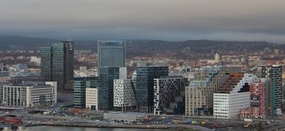 modern city at oslofjord in cloudy weather, norway, oslo