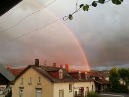 rainbow over roof