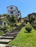 beautiful houses near stairway on hill side, chile, ancud