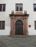 entrance door and windows to the building