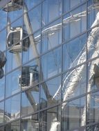 glass facade of a modern building in the sunlight