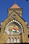 Indian flag on the background of a historic building