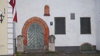oval door of the old town building