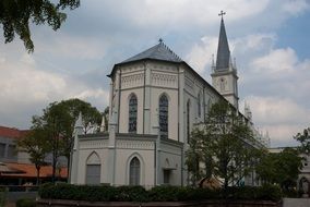 Green trees near the church building