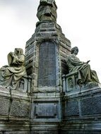 Great monument of statues sitting on thrones