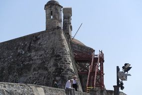 visitors of medieval historic stone castle