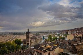 thunderstorm clouds over historical city