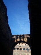 the shadow of the Colosseum in Rome