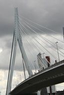 bridge element and city at cloudy sky background