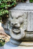 stone sculpture of a lion's face
