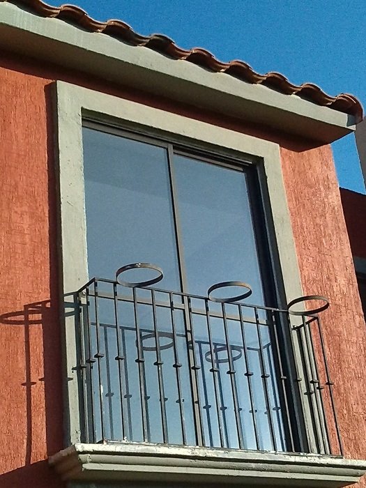 balcony grate on the facade of the building