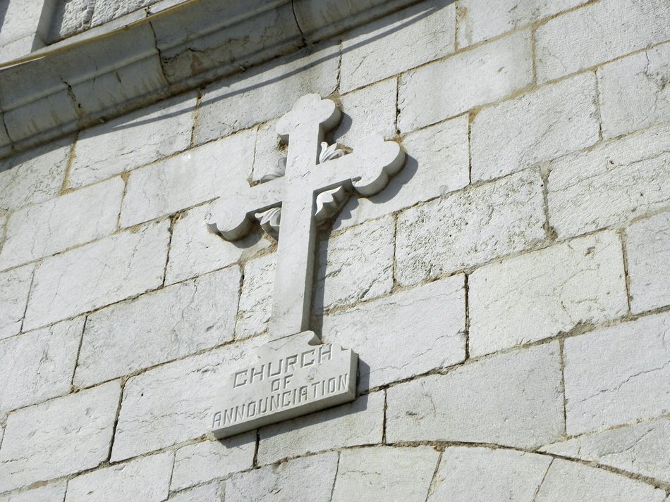 cross on the wall of Nazareth in Israel