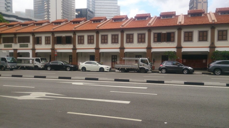 cars parked near shops in singapore