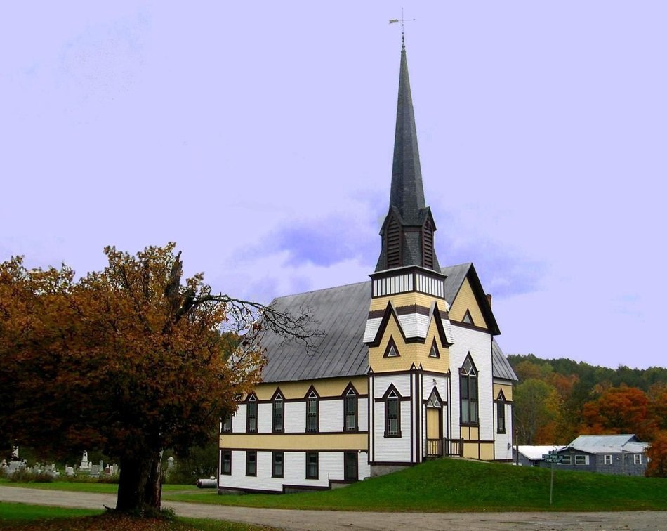 church with a spire in the village