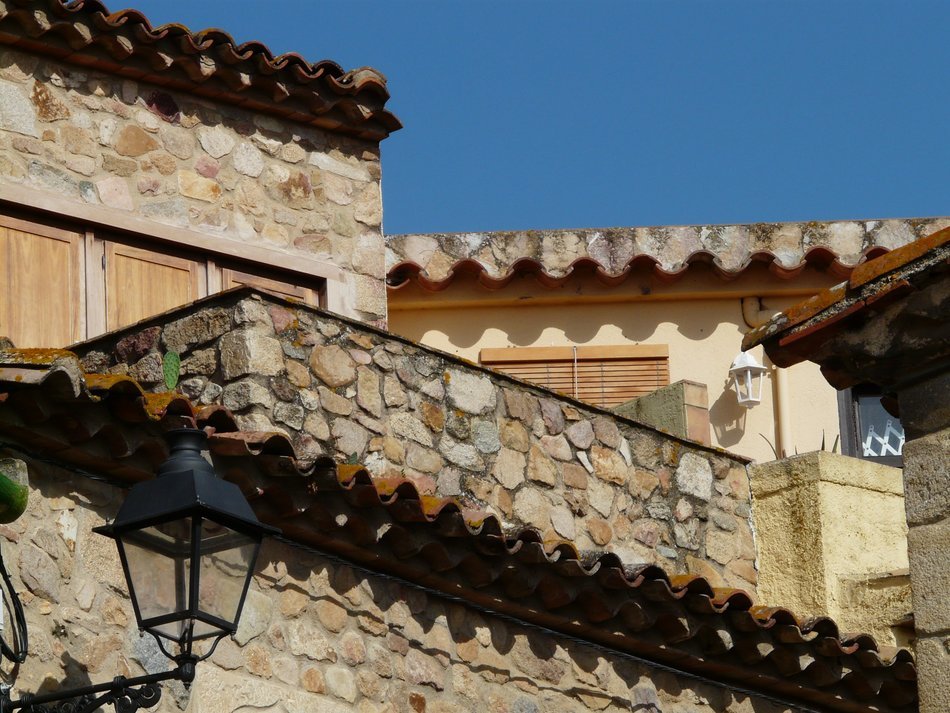 stone balcony and roofs in the village