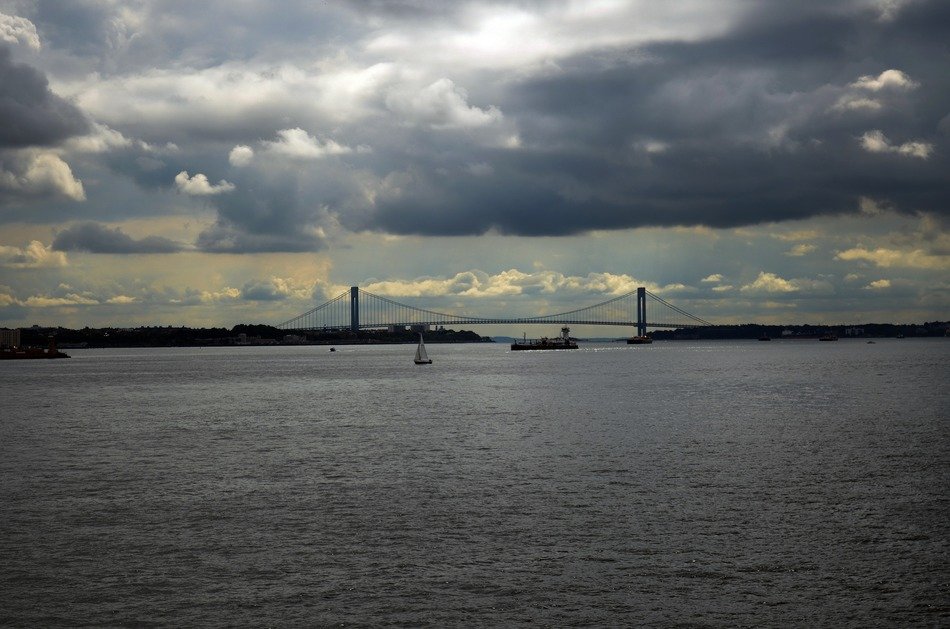 new york city bridge with clouds