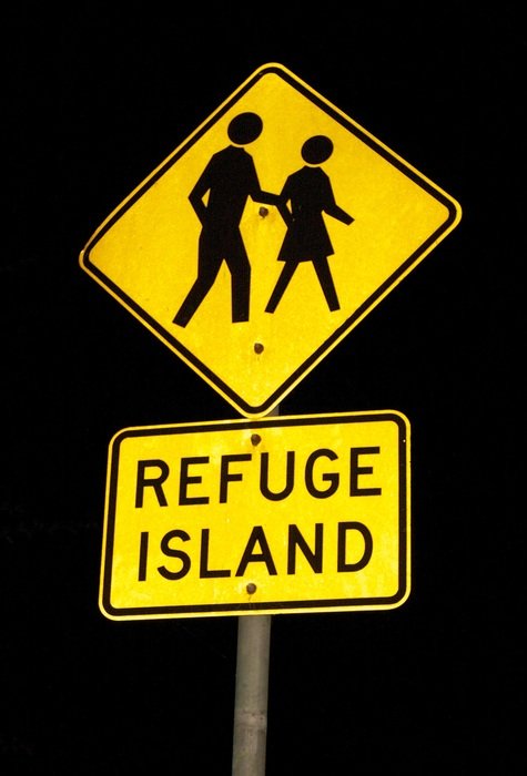 yellow sign with man and woman