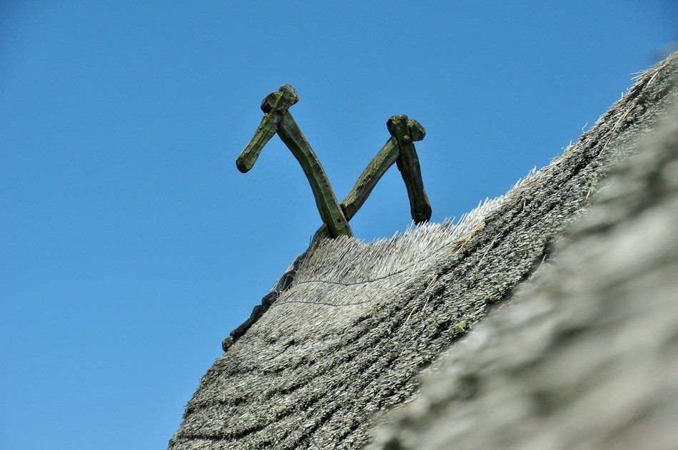 metal poles on the roof of the house