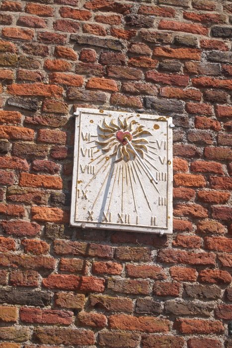 sundial on old wall in the Netherlands