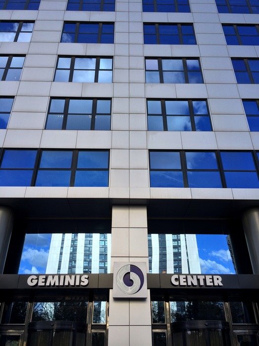 picture of the buildings with blue windows Gemini Center