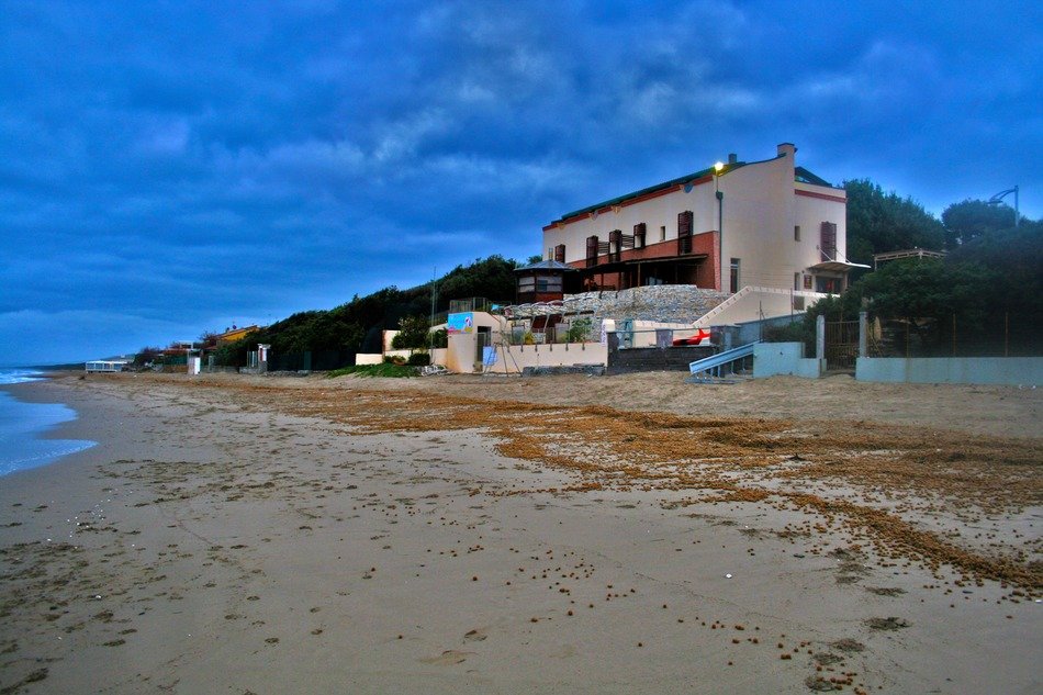 house on the sandy coast of Italy