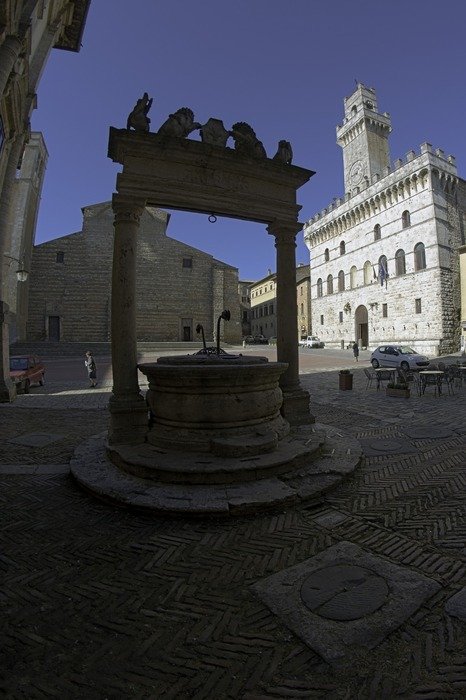 landscape of well on the town hall square in Montepulciano