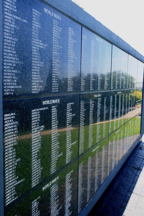 granite wall with names of victims