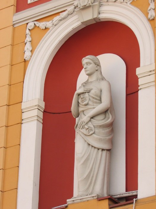 statue on the facade of the building in Romania