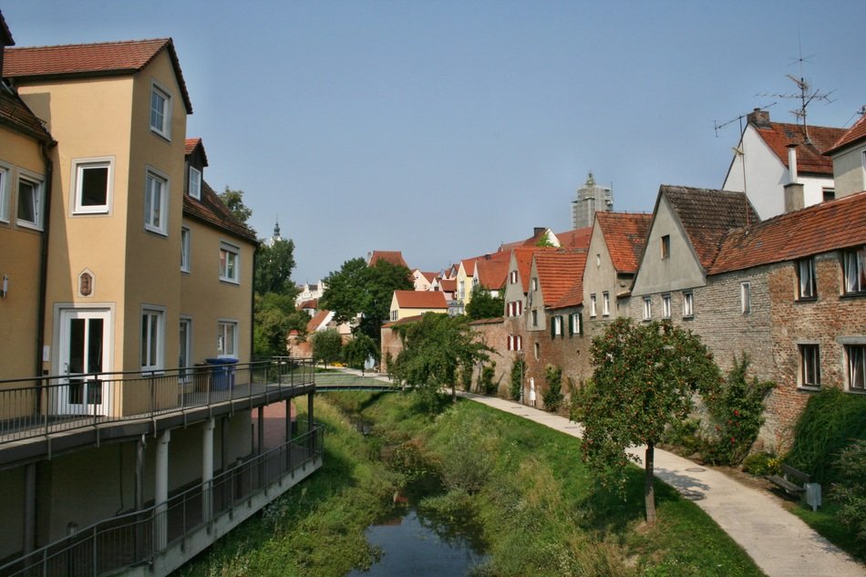 buildings along the banks of a small river in donauwÃ¶rth