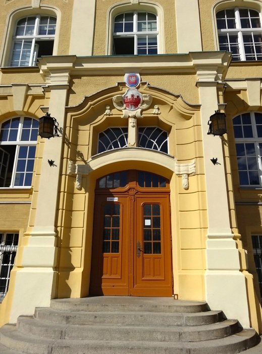 wooden door on the building in Bydgoszcz