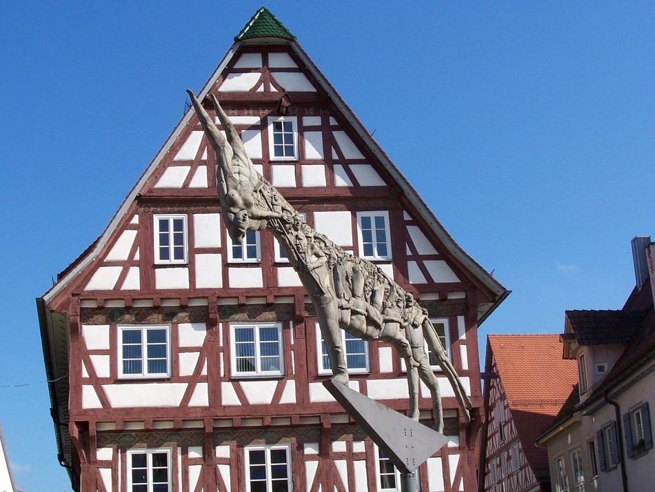 sculpture on the background of the house in Germany