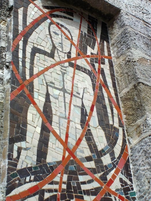 Mosaic image on a stone wall