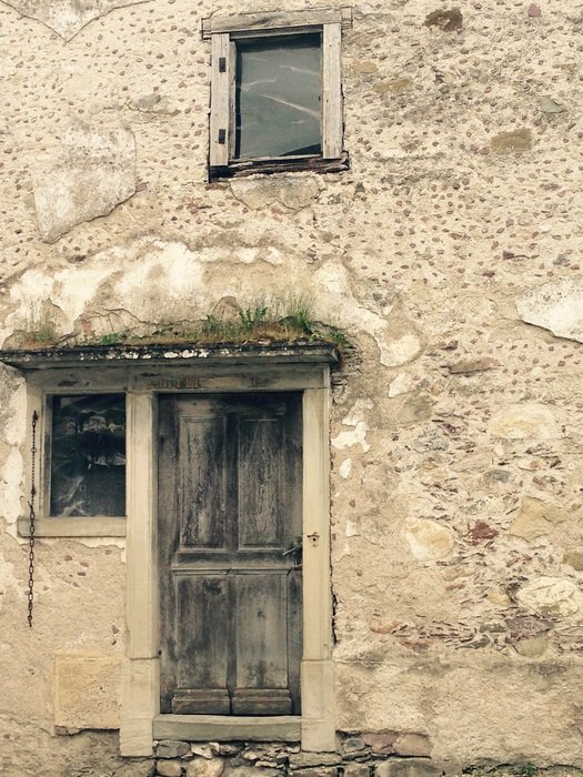 wooden door on an old building