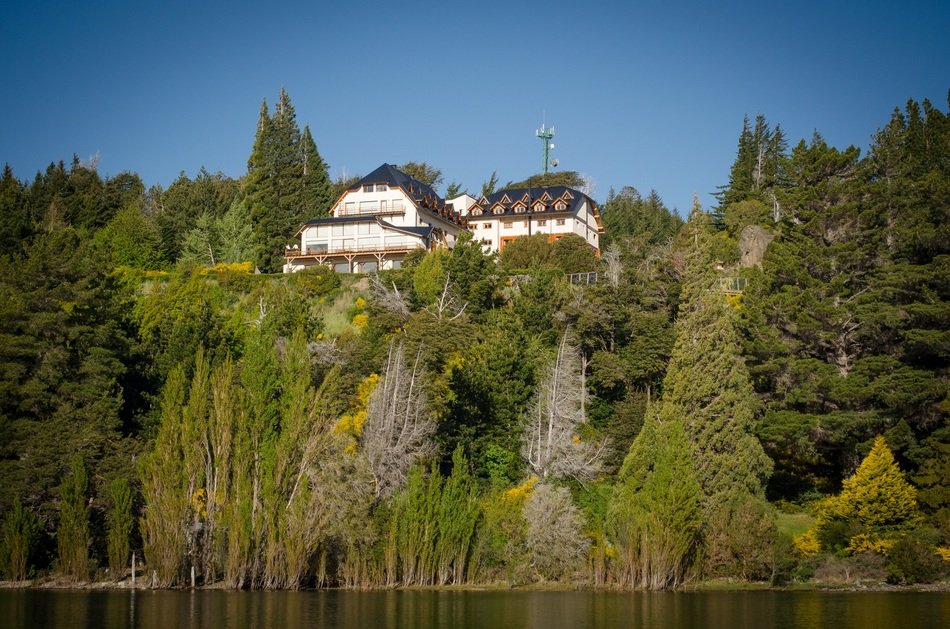 white house on forest mountain