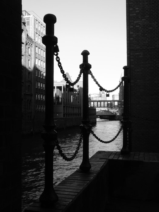 View through the chains to the harbor of the city of Hamburg