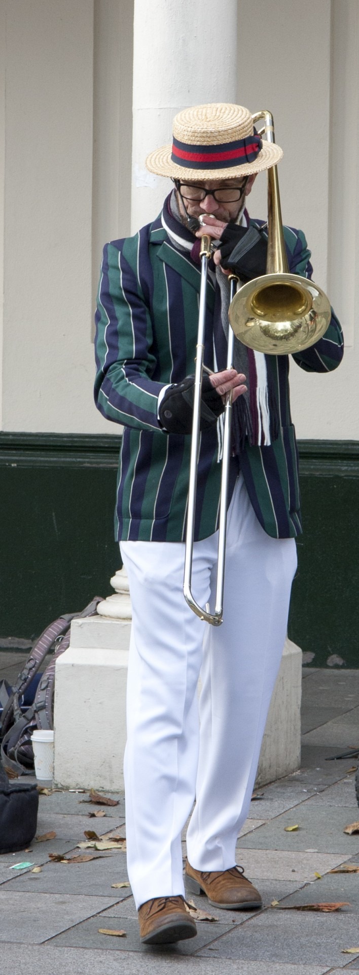 Street musician plays the trumpet free image download