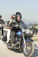 driver and passenger on a retro motorcycle